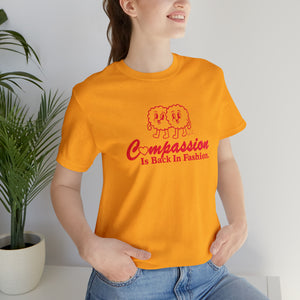 Compassion Is Back In Fashion [UK-Printed] - Unisex Jersey Short Sleeve Tee