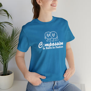 Compassion Is Back In Fashion [UK-Printed] - Unisex Jersey Short Sleeve Tee